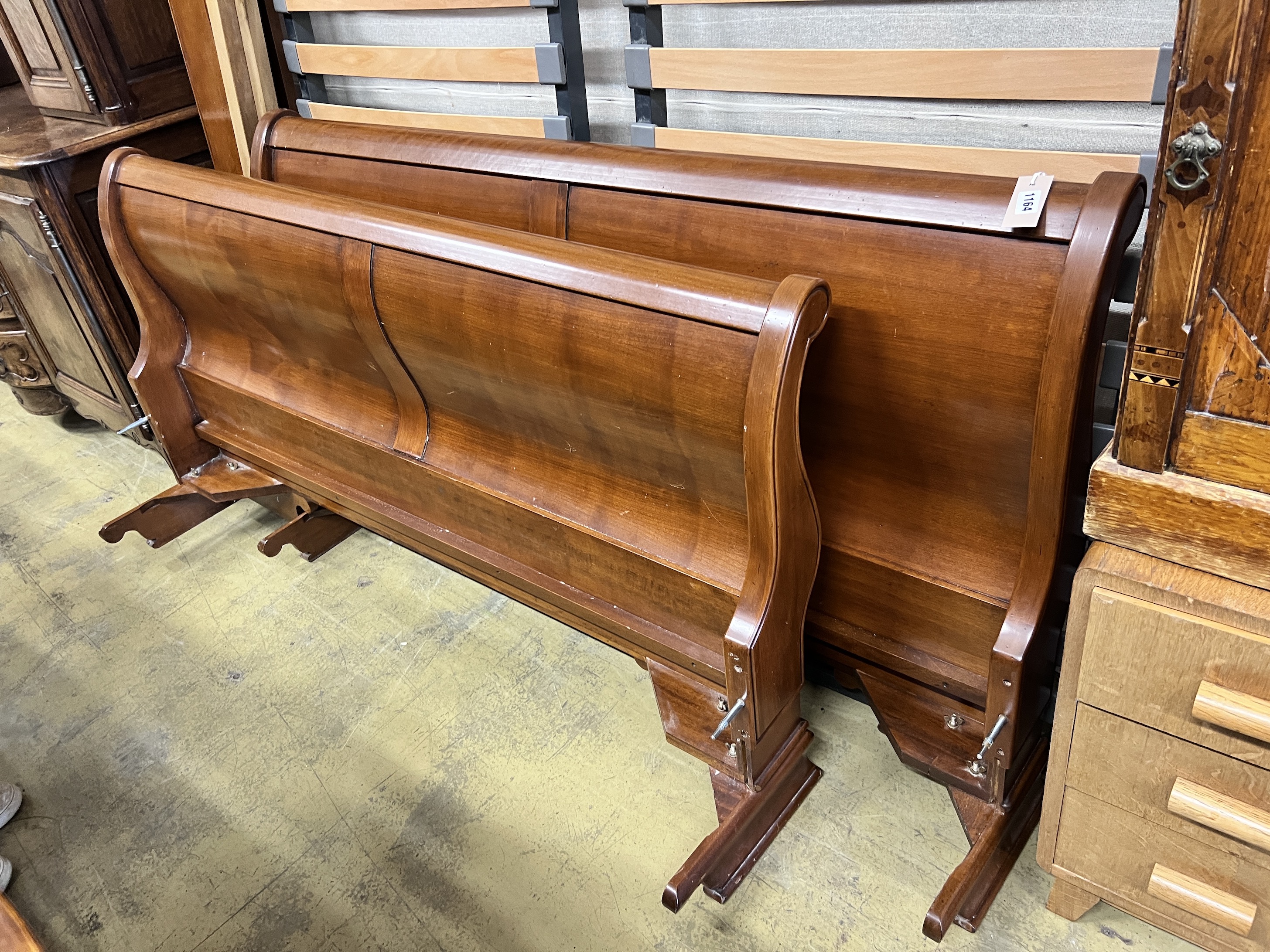 A modern cherrywood double sleigh bed, width 158cm